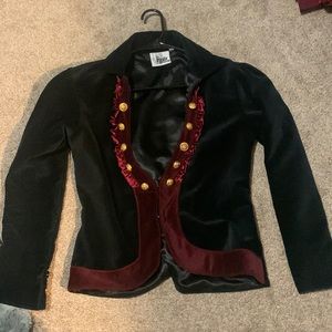 The Pirate Dressing woman’s size M coat runs a little small.